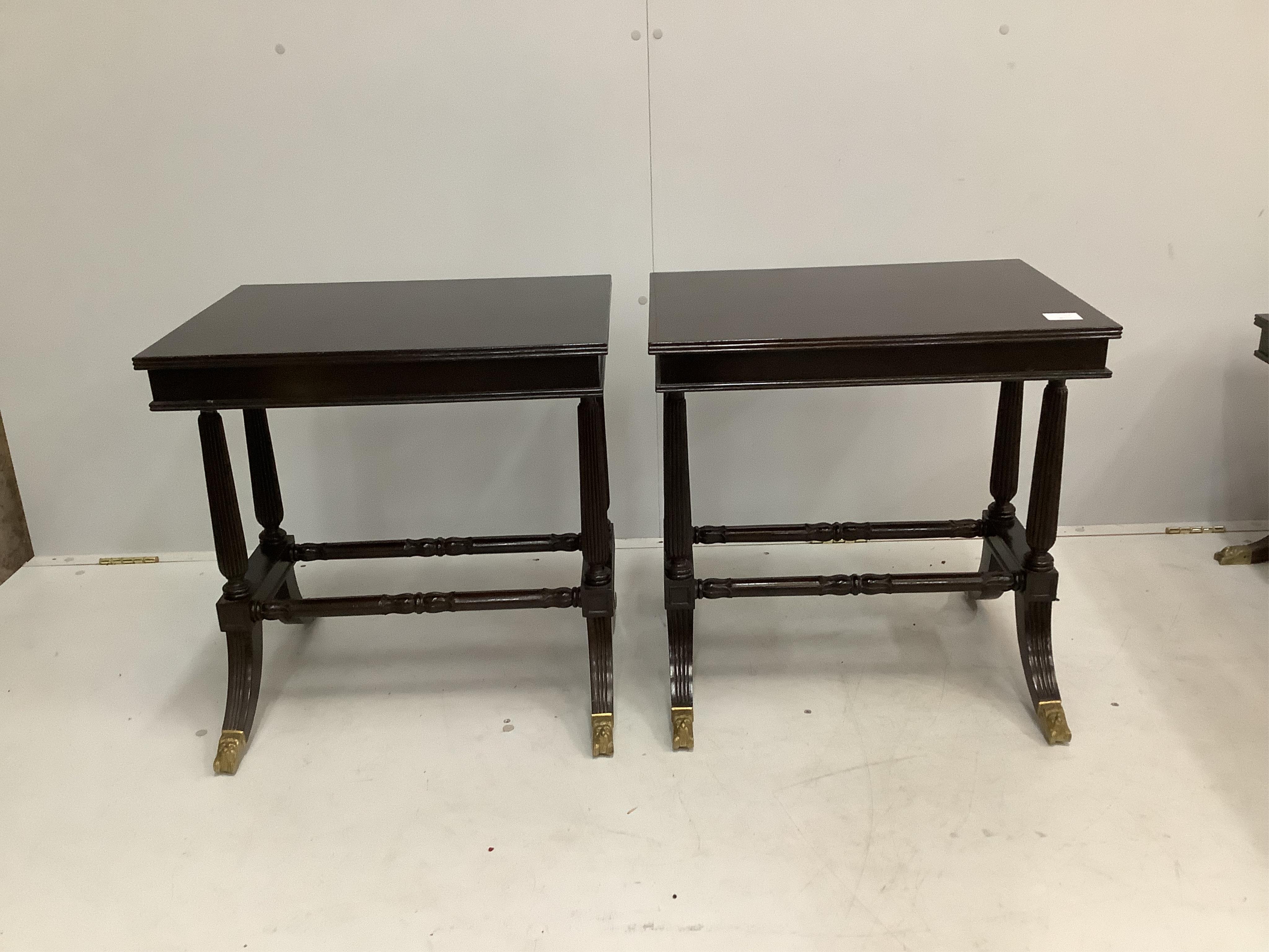 A pair of Regency style rectangular mahogany occasional tables, width 56cm, depth 42cm, height 58cm, together with a matching rectangular coffee table. Condition - fair